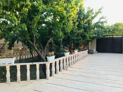 نمای چوبی-باغ ویلا 601 متری در شهریار