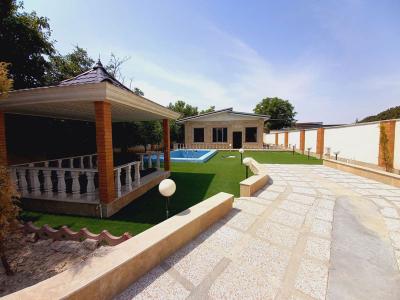 دارای دو اتاق خواب به صورت مستر روم در ابعاد مناسب-1000 متر باغ ویلای نوساز در ملارد